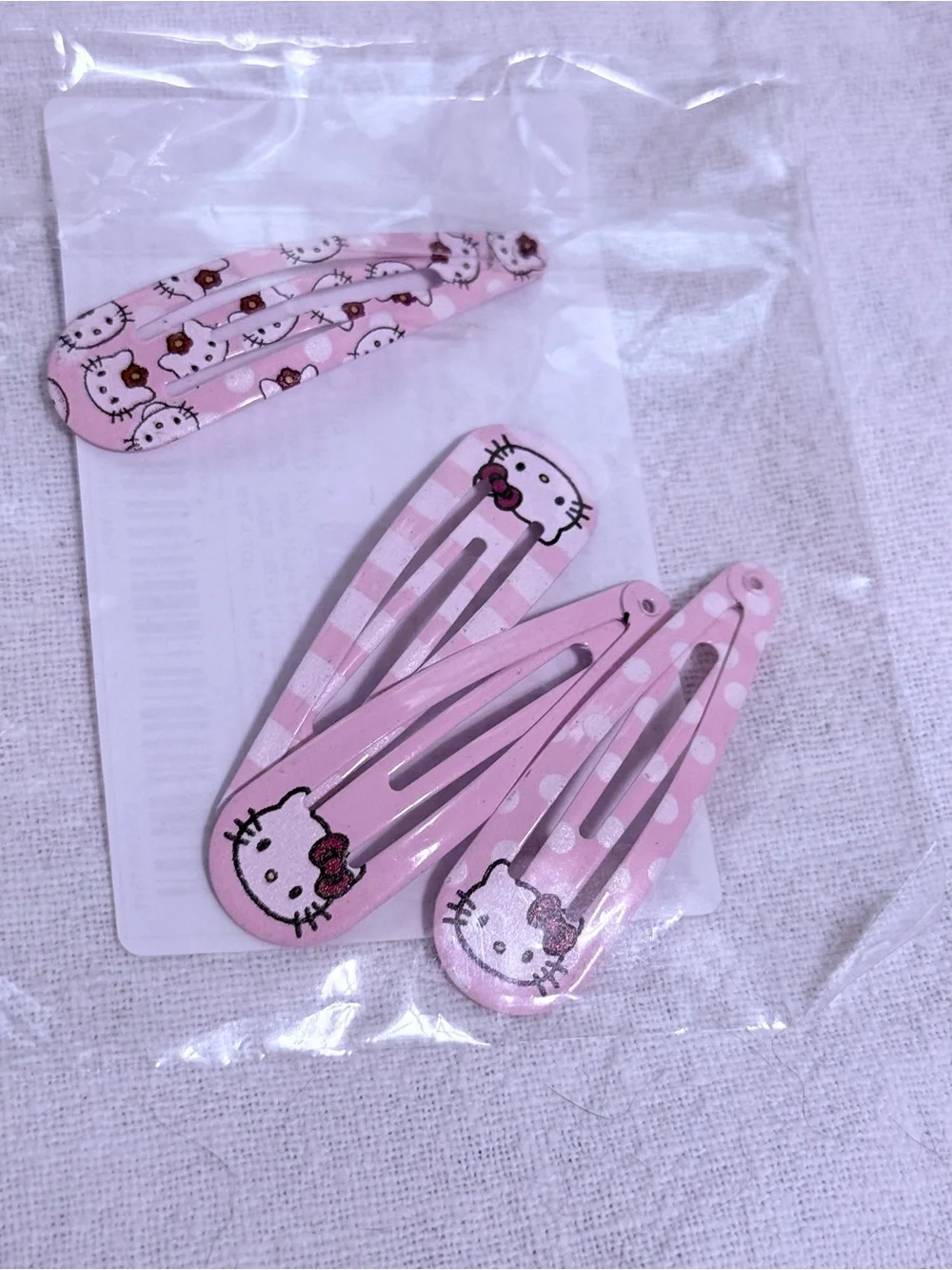NWT-Sanrio Hello Kitty 4-Piece Pink Print Metal Hair Pins Set